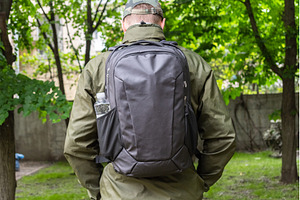 A man with a backpack, rear view. A, a Person Photo by Stockphoto by vzwer