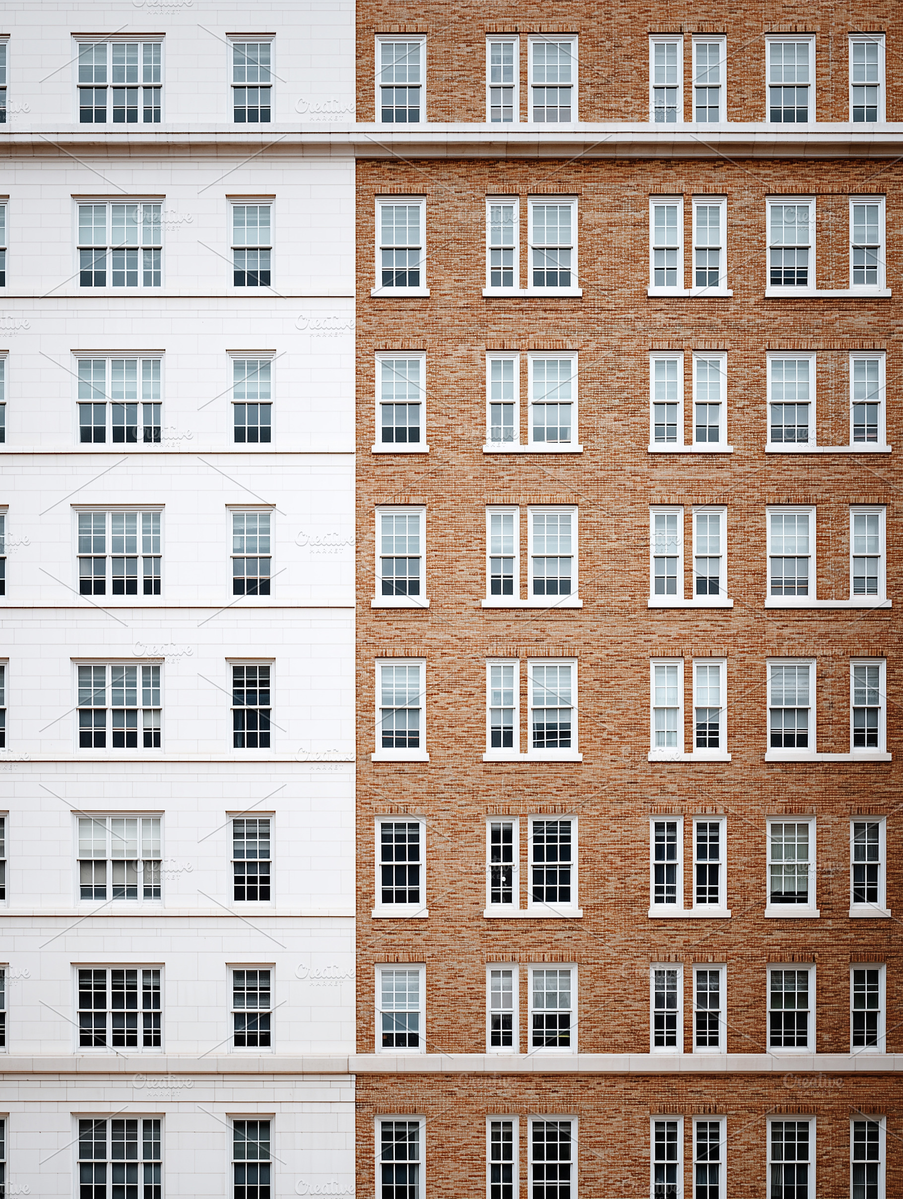 Split facade of buildings, an Architecture Photo by MistyDay