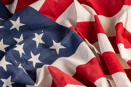 part of the American flag with stars and red and white stripes, a Photo by MyPhotos