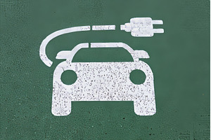 Electric cars are being charged at, a Transportation Photo by ZinetroN