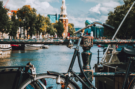 Close-up of Bike parked on a bridge, an Architecture Photo by Igor Tichonow