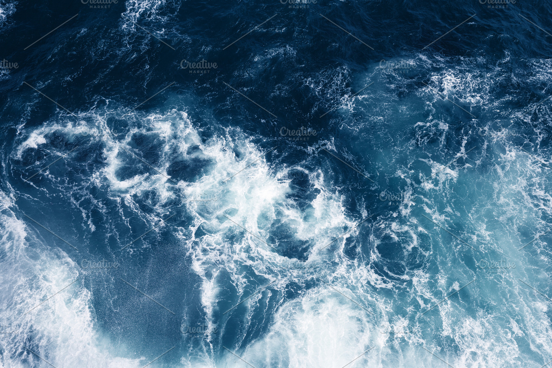 Top view on blue ocean waves, a Nature Photo by Olga_Z