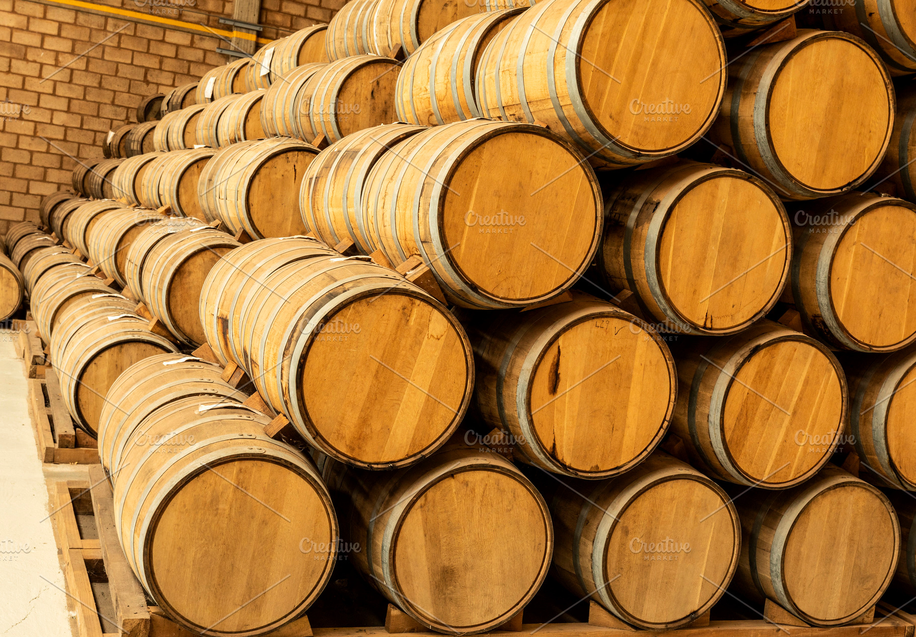 Wine barrels on old cellar, an Architecture Photo by Mexico stock images