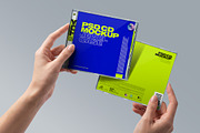 CD Jewel Case Mockup - Hands Holding, a Mockup by Avelina Studio (Thumbnail 1 of 3)