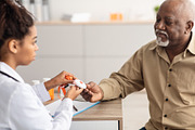 Emergency call system. Doctor giving Alarm Button to Senior Man, a Photo by Prostock-Studio (Thumbnail 2 of 2)