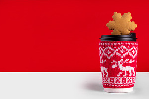 Take out coffee cup in winter decorative sweater decor, a Holiday Photo by Rimma