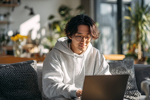 Remote Laptop Work at Home, a Business Photo by shahsoft
