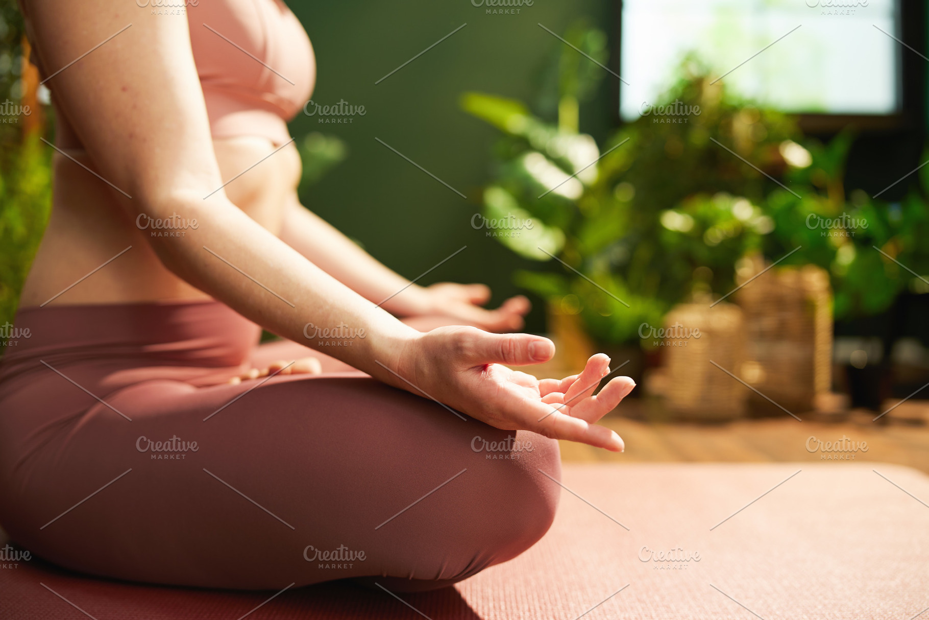 Modern 30 years old woman at green home meditating, a Person Photo by Alliance Images