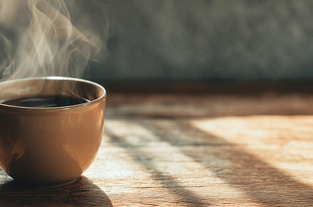 Close up of a steaming cup of coffee, a Food & Drink Photo by MistyDay