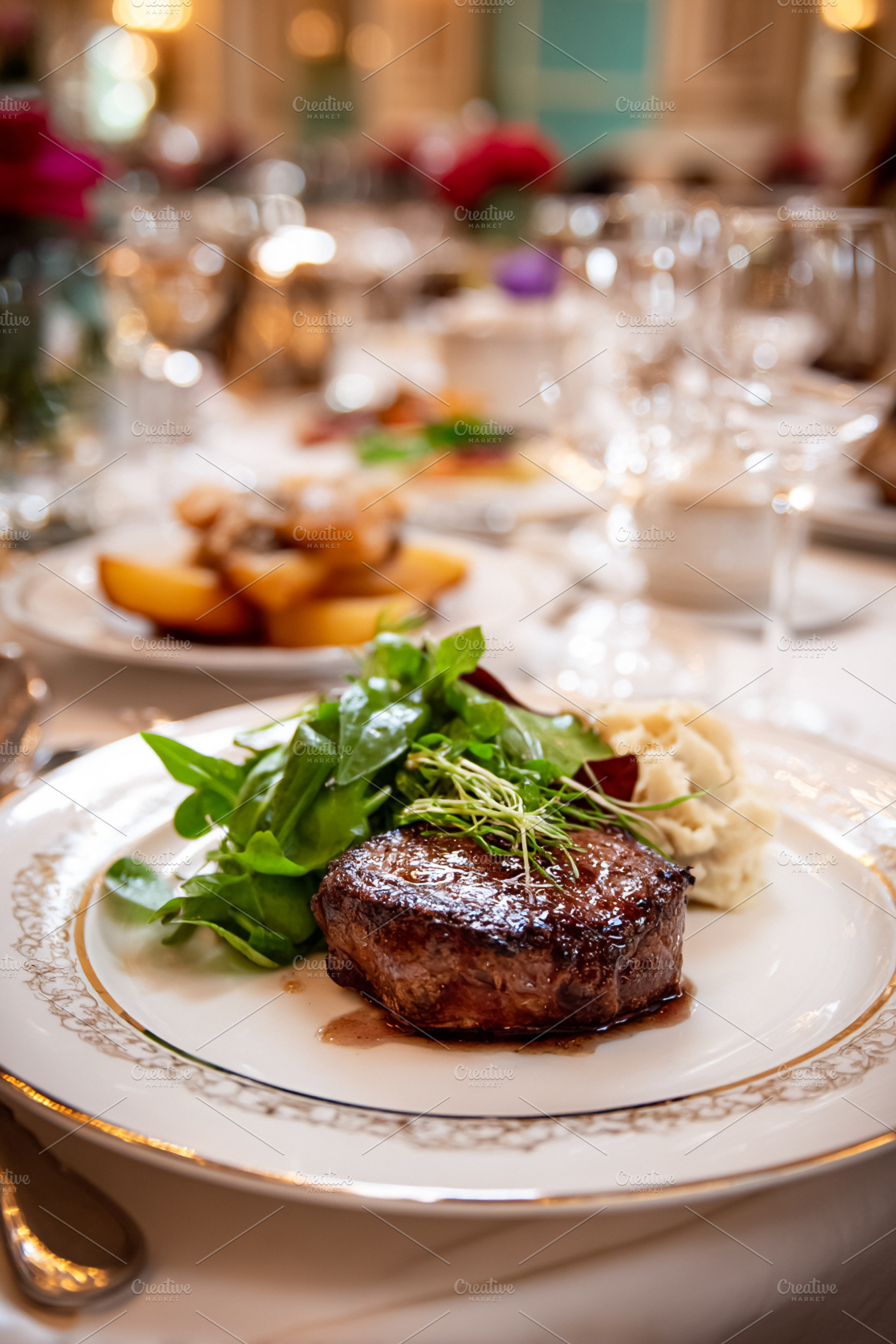 Gourmet filet mignon steak served with green salad and mashed po, a Food & Drink Photo by Studio ANNA