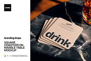 Square Coasters on Table Mockup, a Cups & Container Mockup by creatsy5 (Thumbnail 1 of 5)