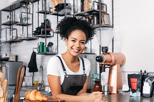 Beautiful female barista, a Food & Drink Photo by Artem Varnitsin