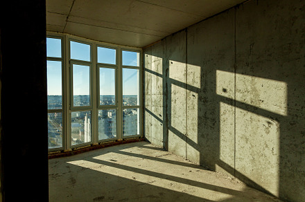 Empty rooms in a house under construction, an Industrial Photo by Photostock