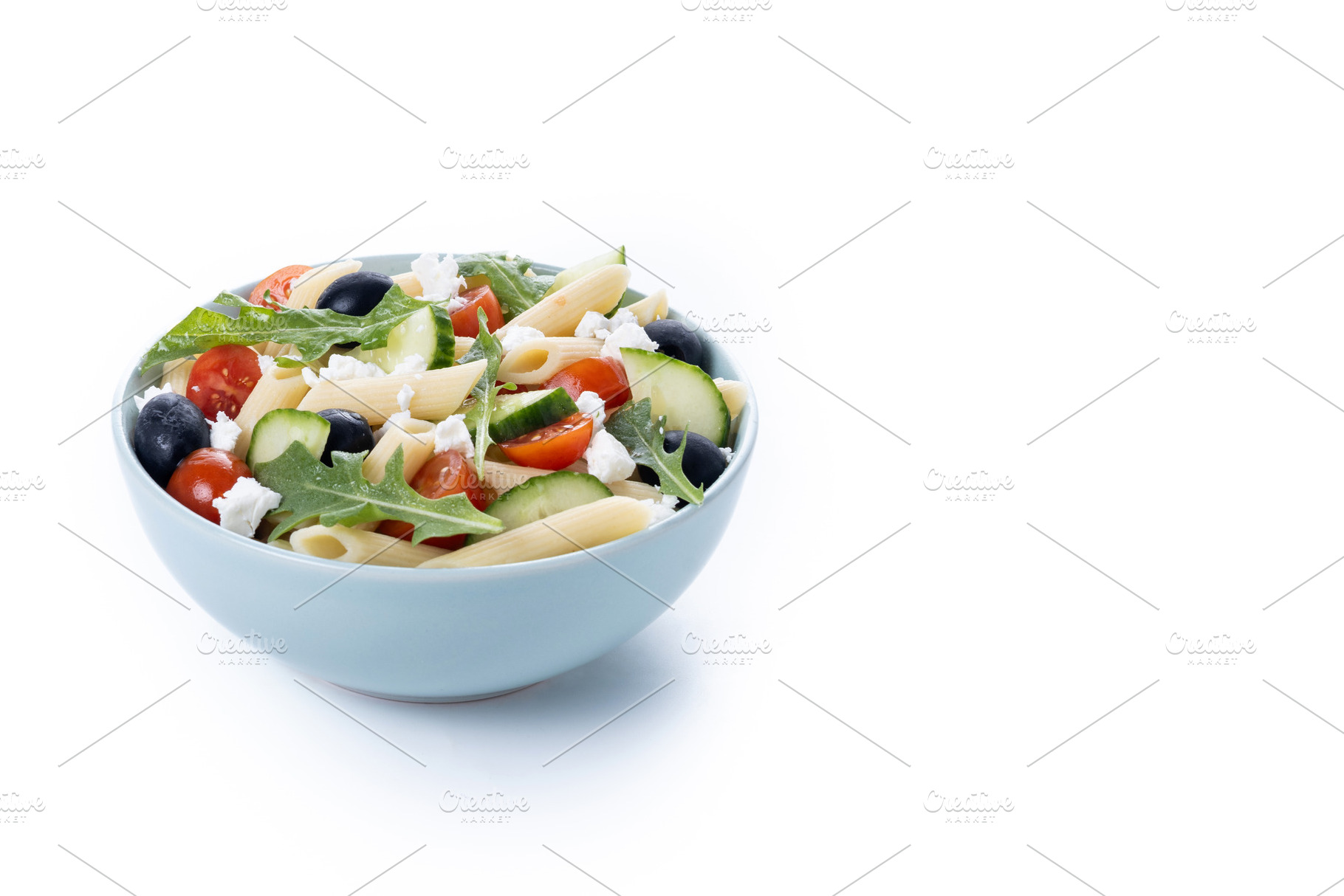 Mediterranean Pasta Salad with Fresh Vegetables and Herbs isolated on white bac, a Food & Drink Photo by etorres69