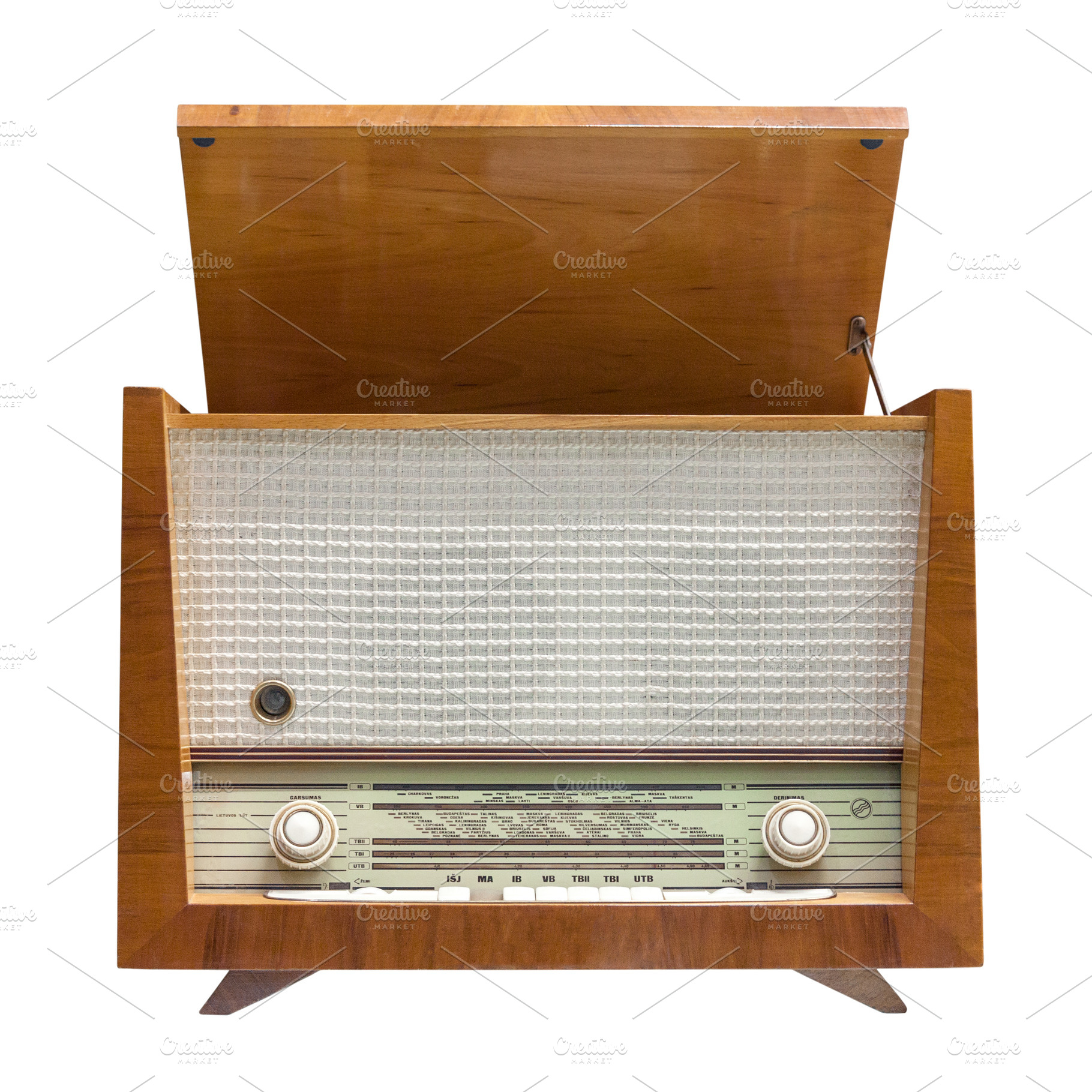 Old vintage radio isolated on white, a Technology Photo by BOOCYS