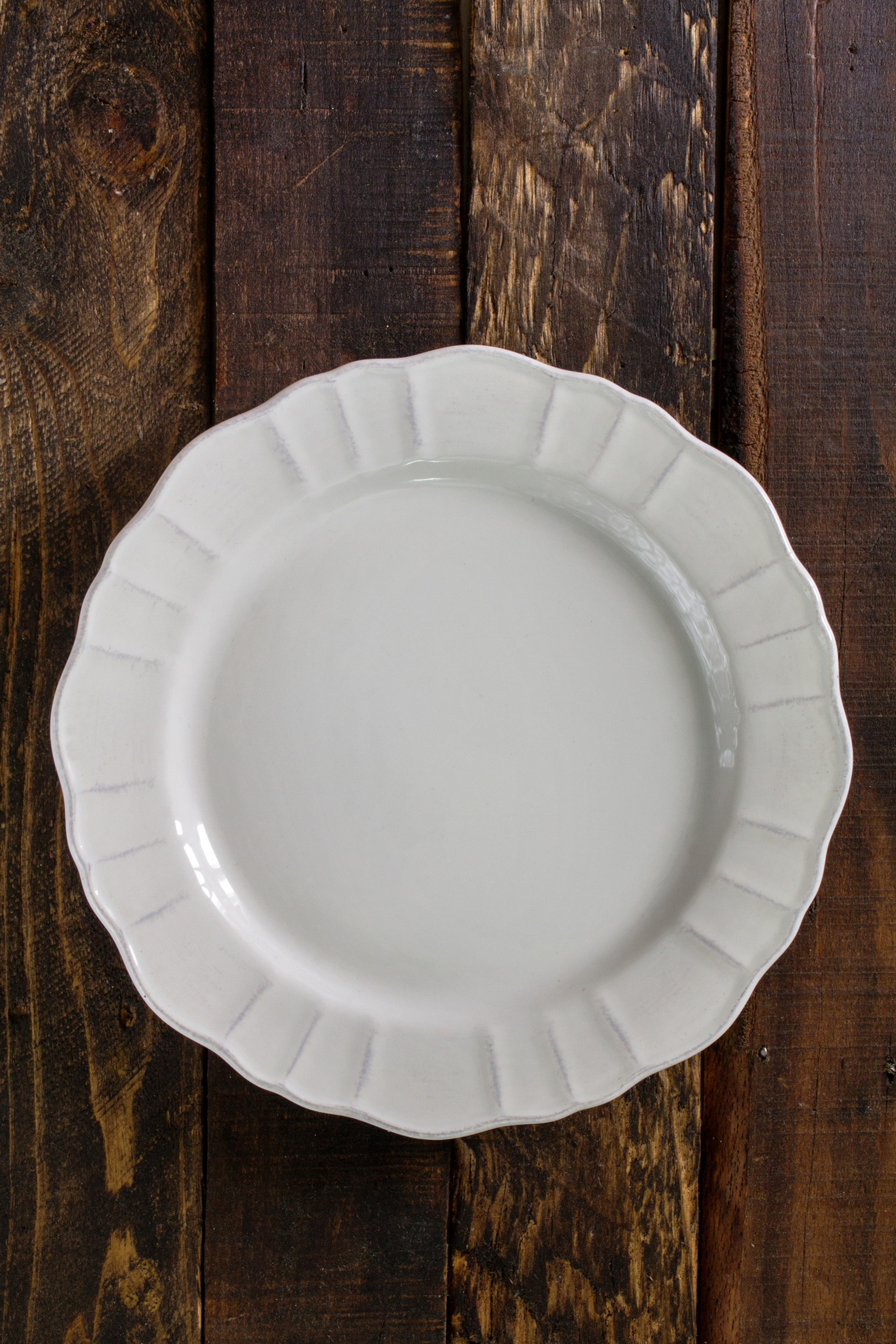 White plate, on wooden rustic background, a Food & Drink Photo by SZ IMAGE
