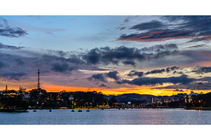 Sunset at xuan huong lake in dalat containing vietnam, dalat, and sunset, an Architecture Photo by Leonid Andronov