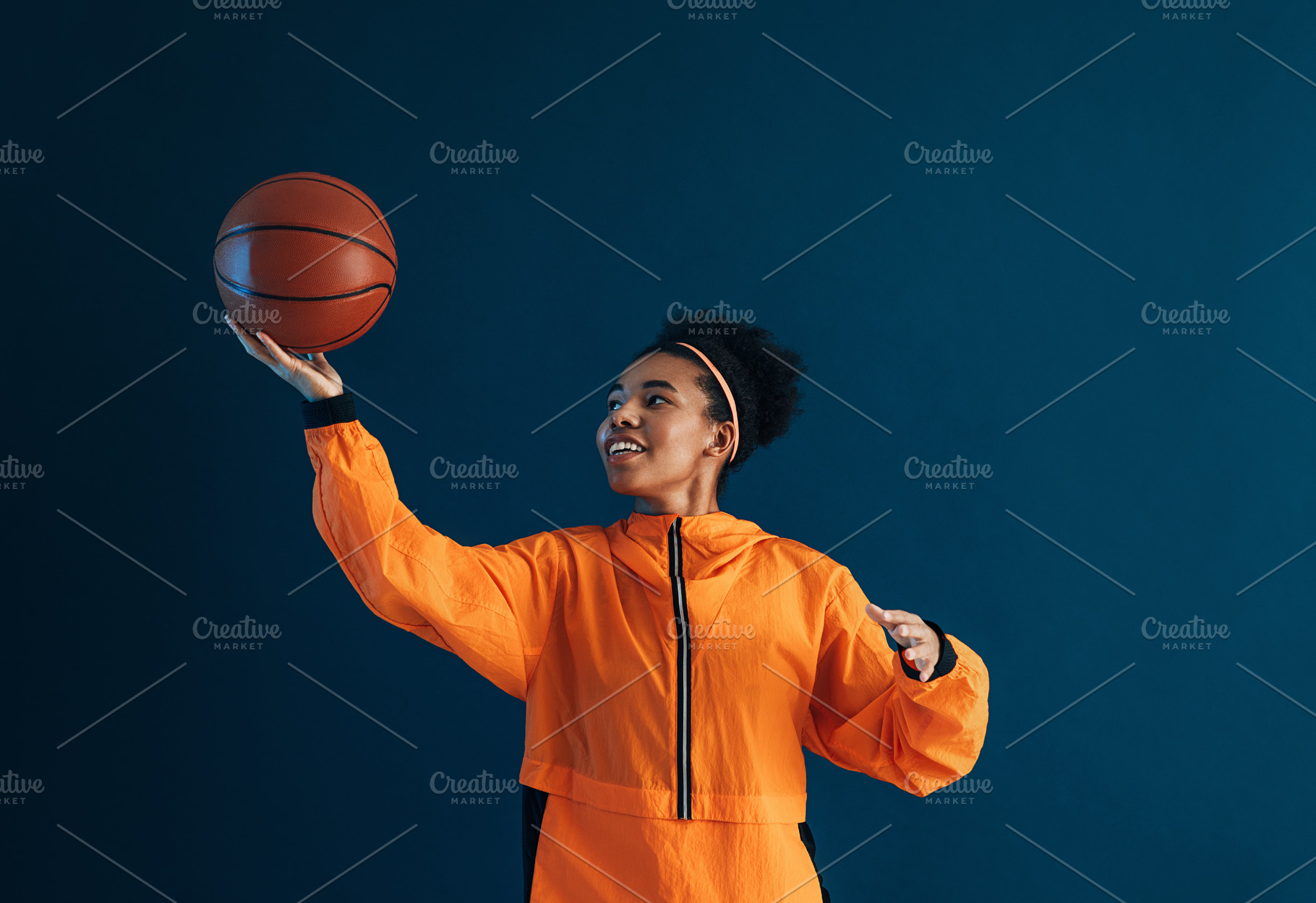 Young woman playing with a basketbal, a Sports & Recreation Photo by Artem Varnitsin