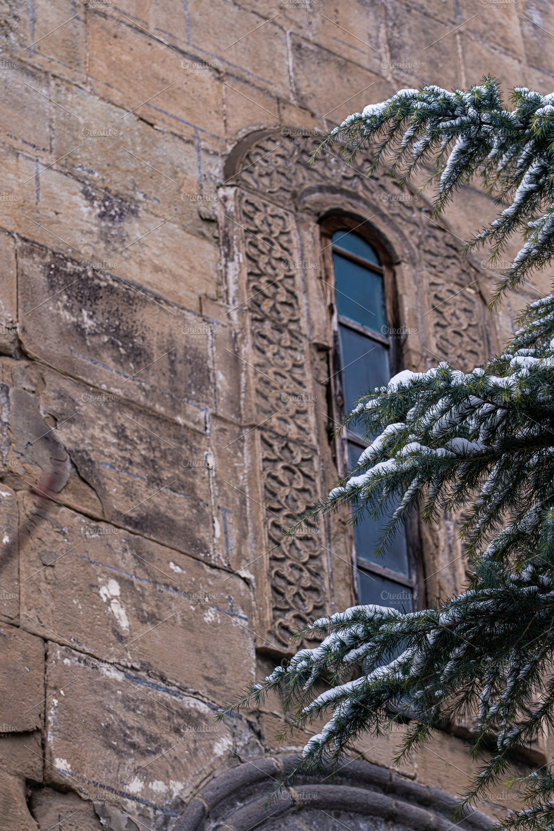 Old church wall with window in Tbilisi's downtown, an Architecture Photo by Anna Bogush