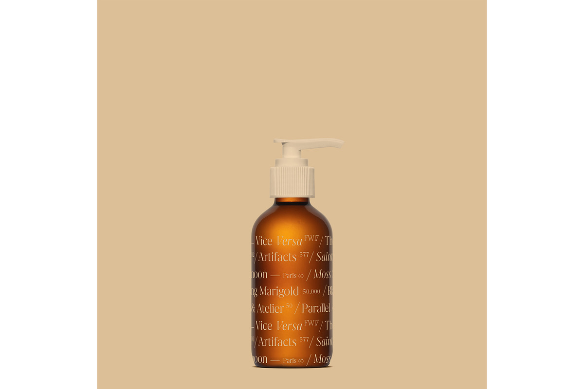 Amber Cosmetic Pump Bottle Mockup, a Cups & Container Mockup by Copal (Photo 7 of 16)