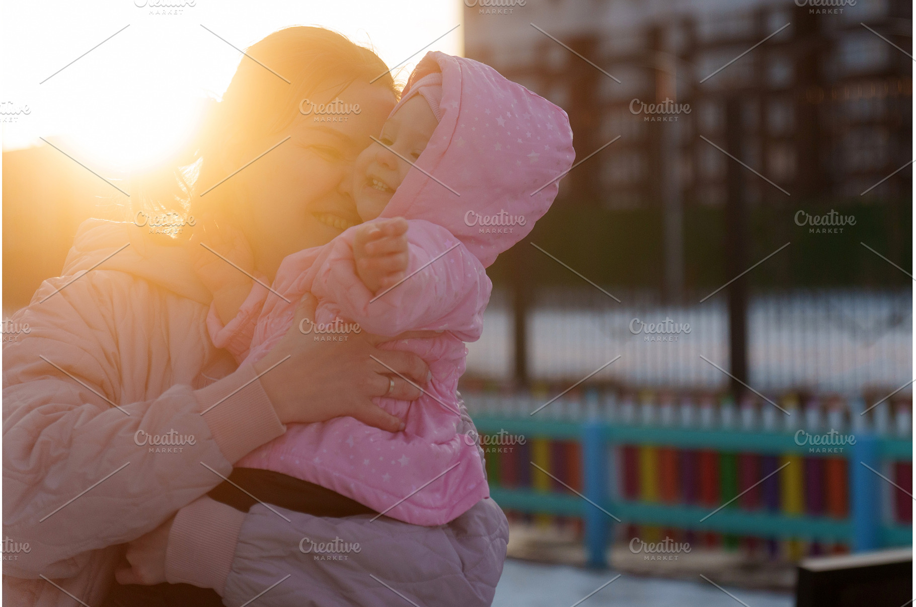 Mother embraces child at sunset in, a Nature Photo by darksoul72