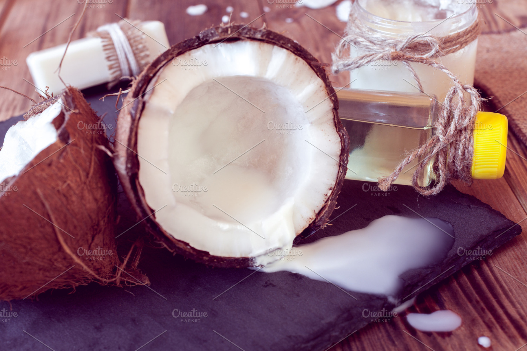 Coconut products for hair care containing background, body, and bottle, a Beauty & Fashion Photo by Eni_fly