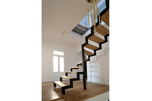 Metal staircase in modern home, an Architecture Photo by Neirfy