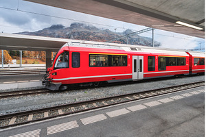 Red modern passenger train on, a Transportation Photo by den-belitsky