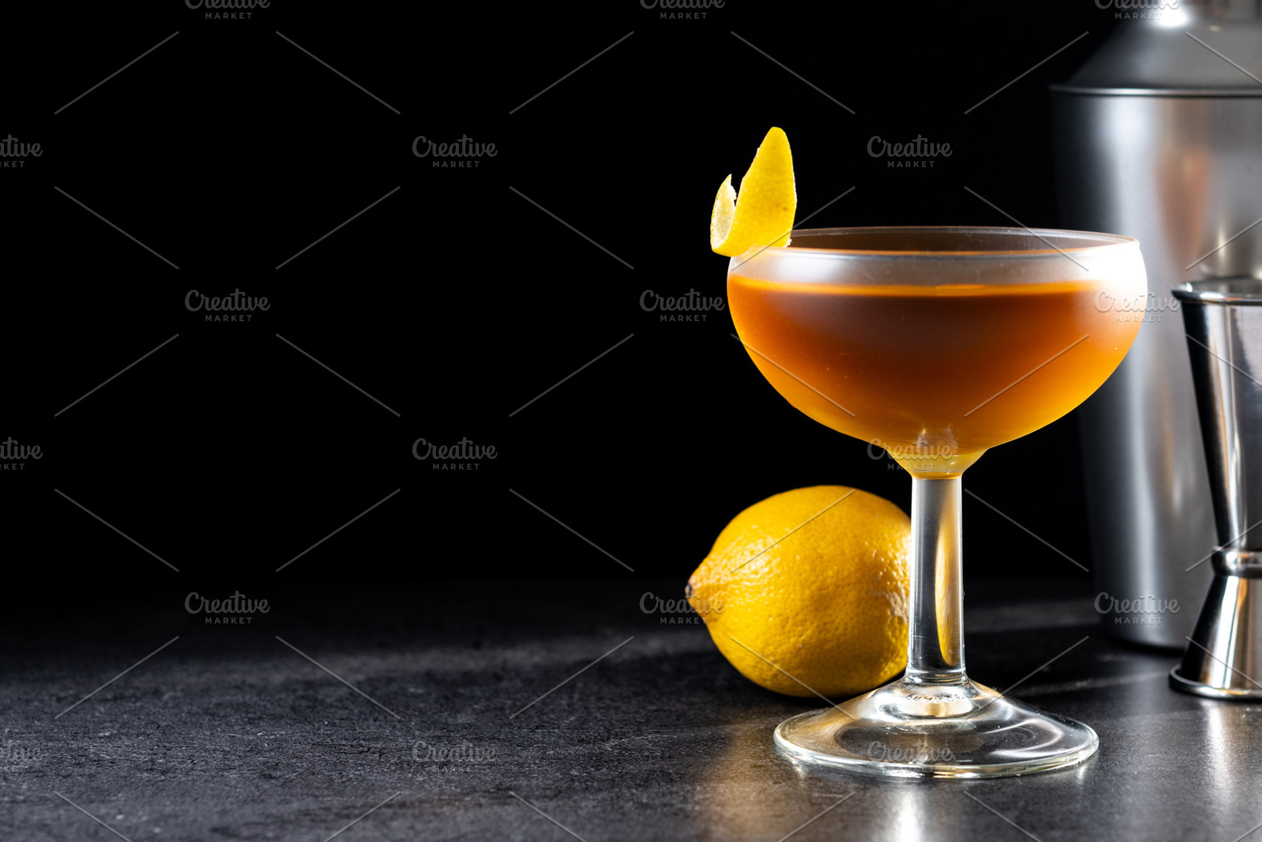 Paper plane cocktail on black slate background, a Food & Drink Photo by etorres69