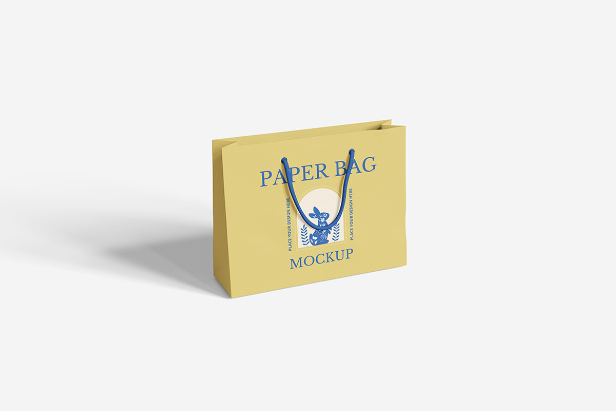 Paper Bag Mockup, a Merchandise Mockup by Indah (Photo 2 of 6)