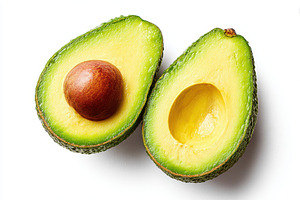 Freshly sliced avocado on white background, a Food & Drink Photo by AlyaAnd