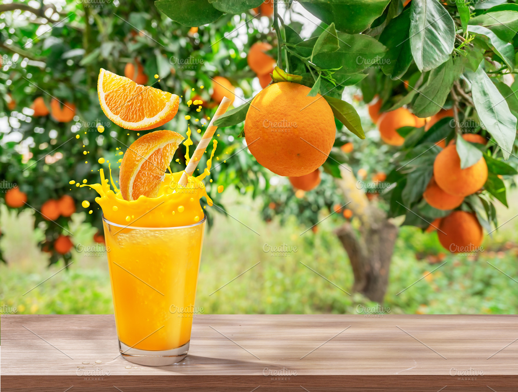 Glass of orange juice with splash, a Food & Drink Photo by Volff