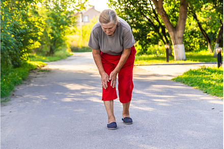 grandmother hurts her knee on the, a Health & Medical Photo by yanadjana