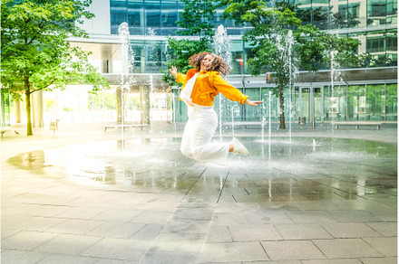 Happy curvy woman in city, a Nature Photo by Neirfy