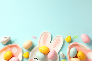 Happy Easter greeting card template. Frame border made of Easter eggs, plates,, a Holiday Photo by photoguns