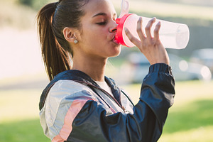 Runner woman containing water, woman, and drinking