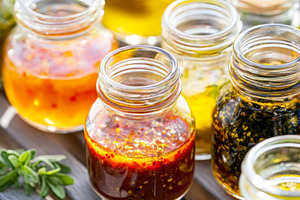 Variety of glass jars with assorted, a Photo by Dvoevnore photos