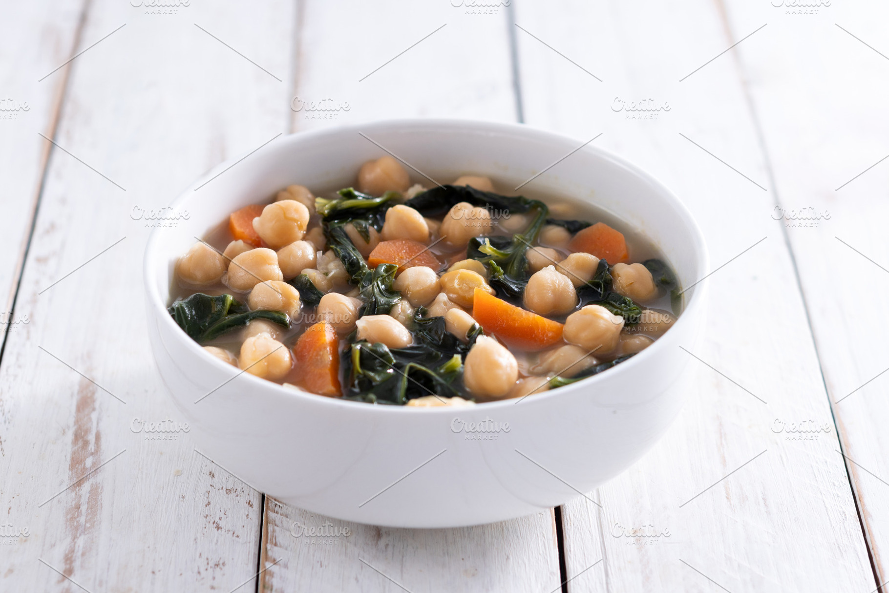 Chickpea and Spinach Soup with Carrots in White Bowl, a Food & Drink Photo by etorres69