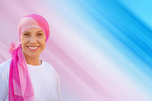 Smiling Woman Wearing Pink Headscarf for Cancer Awareness with S, a Person Photo by José Manuel Gelpi