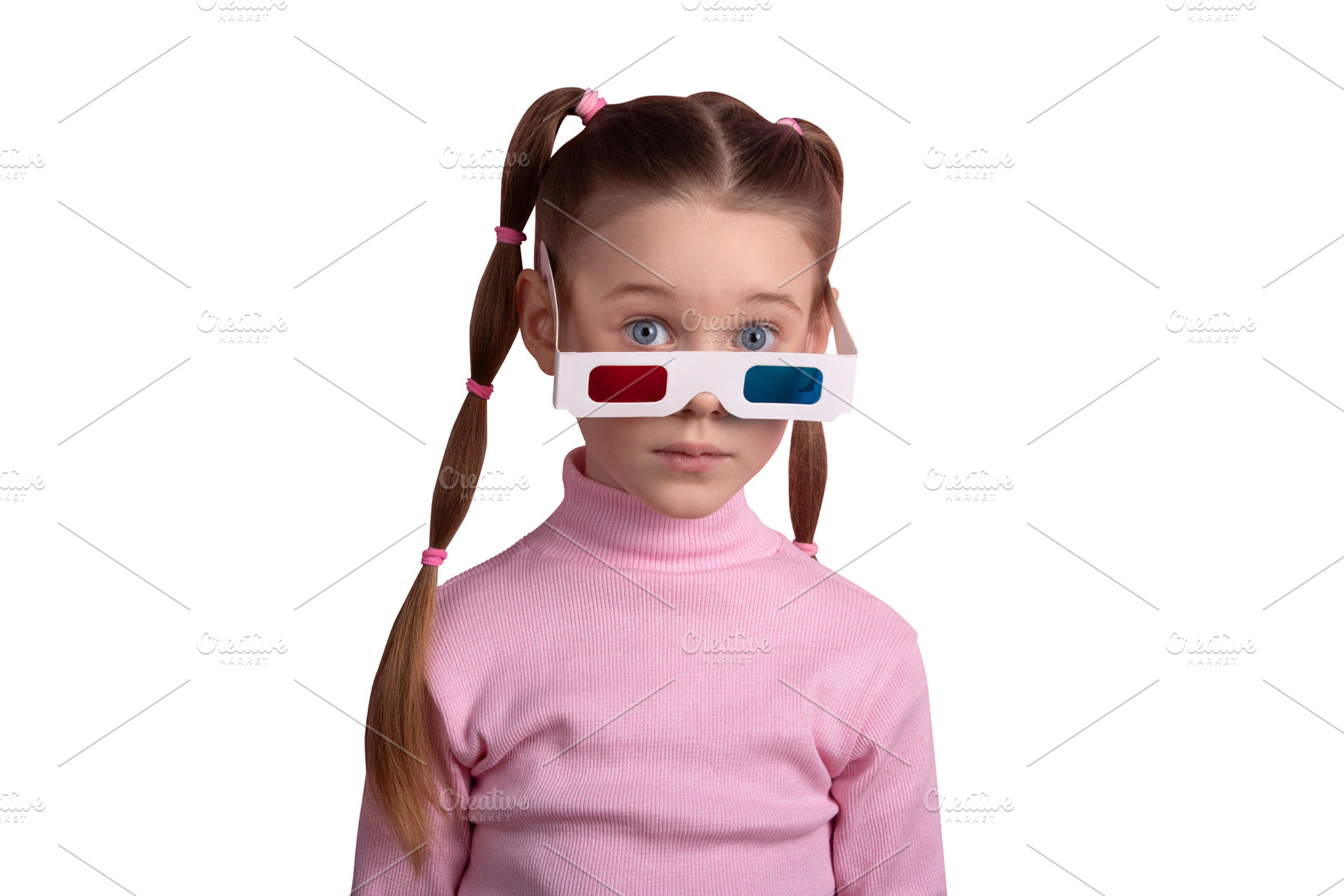 Young girl with pigtails in a pink turtleneck and 3D glasses, lo, a Person Photo by Ales Munt