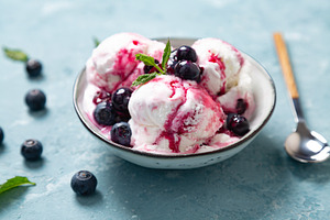Homemade yogurt and blueberry ice cream with natural blueberry s