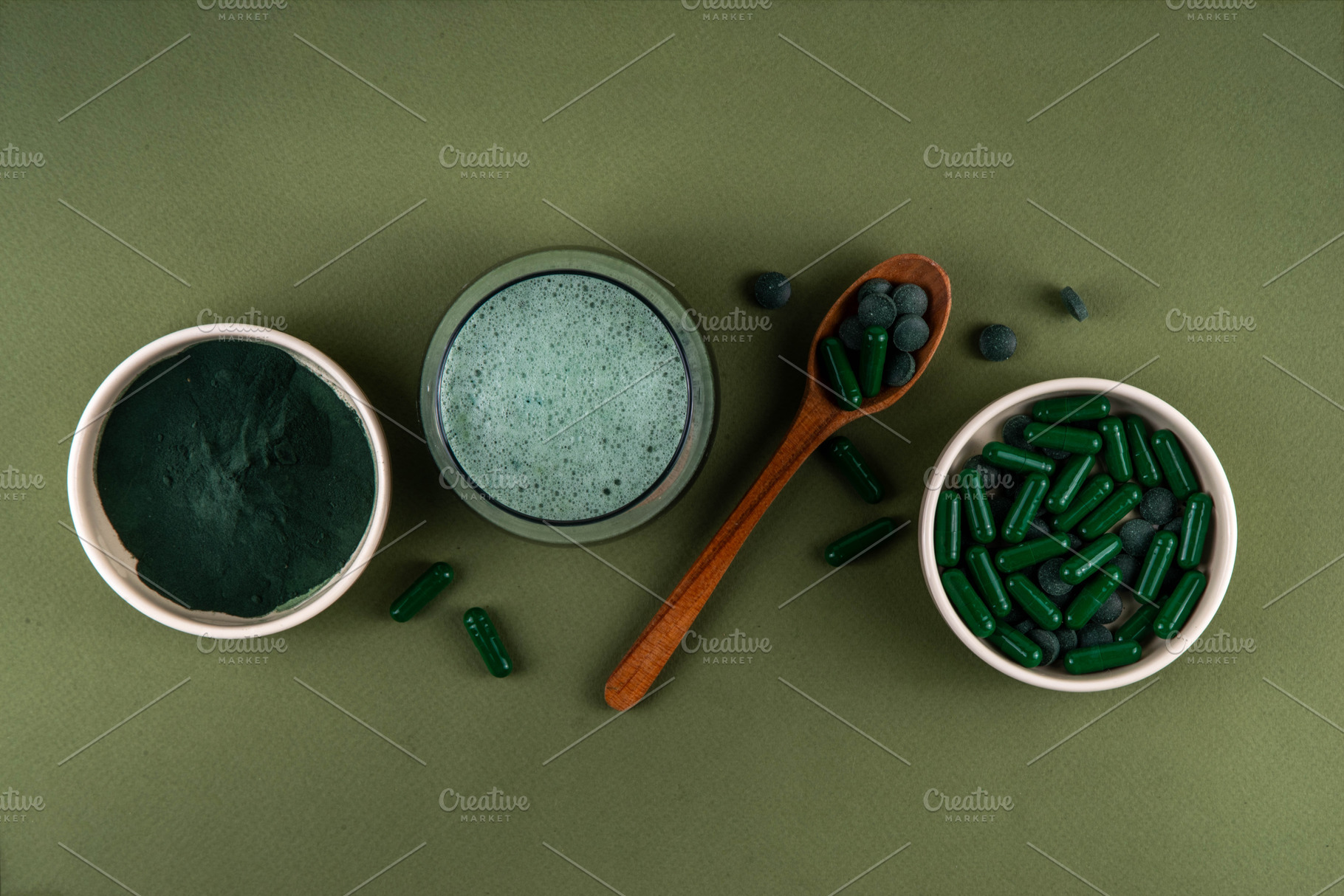 Spirulina in powder, capsules and tablets with spirulina smoothi, a Health & Medical Photo by Rimma