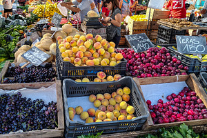 Crowded scene at a street food market in pirapolis city, a Person Photo by DanFLCreativo
