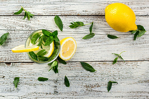 Water with lemon and mint in a glass stock photo containing drink and glass, a Food & Drink Photo by dashtik