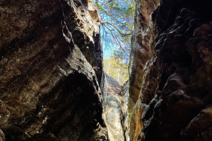 Bright blue sky peeks through narrow canyon walls at Garden of the Gods, Colora, a Nature Photo by AS photostudio