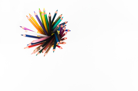 Crayons and pastels on white containing crayon, illustrator, and pastel, an Arts & Entertainment Photo by MM Studio