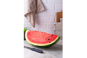 Fresh juicy watermelon on light, a Food & Drink Photo by Yulia Furman
