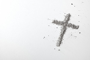 Cross made with ashes on white table top view, a School & Education Photo by Davizro's Market
