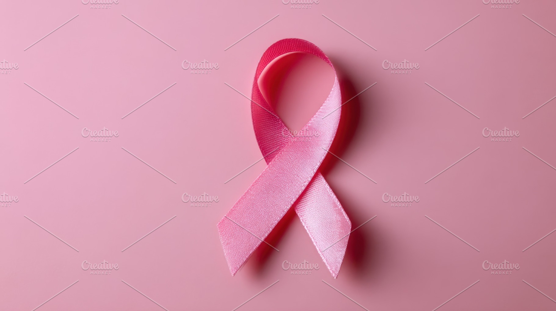 Pink ribbon on a light background, a Photo by Beautiful things