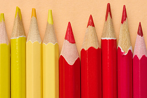 Multicolored wooden pencils in a row, drawing and creativity too, a School & Education Photo by ndanko